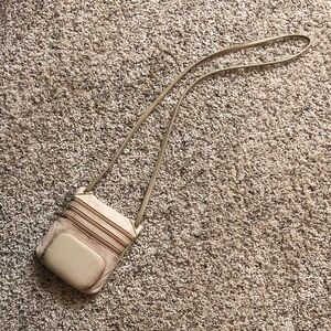 Beige Crossbody leather Bag 5 zippers good for safe travels fits passport